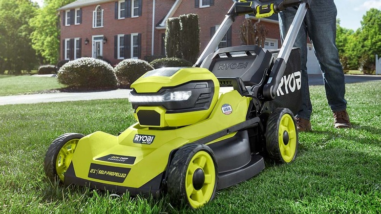 A closeup of an affected Ryobi lawnmower (RY401014BTL) in use
