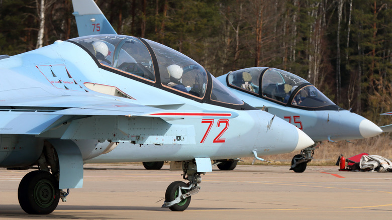 Two Yak-130s with pilots inside.