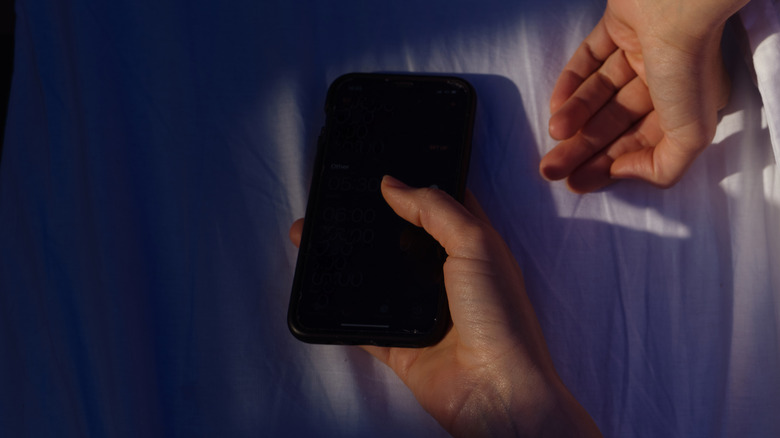 an iPhone in bed