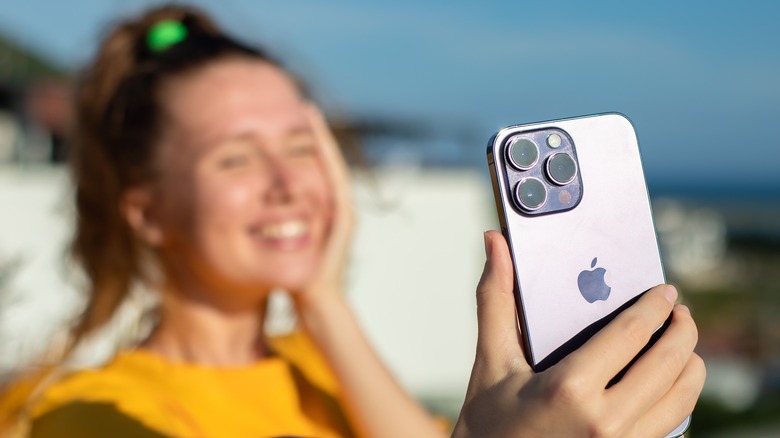 woman taking a selfie iPhone