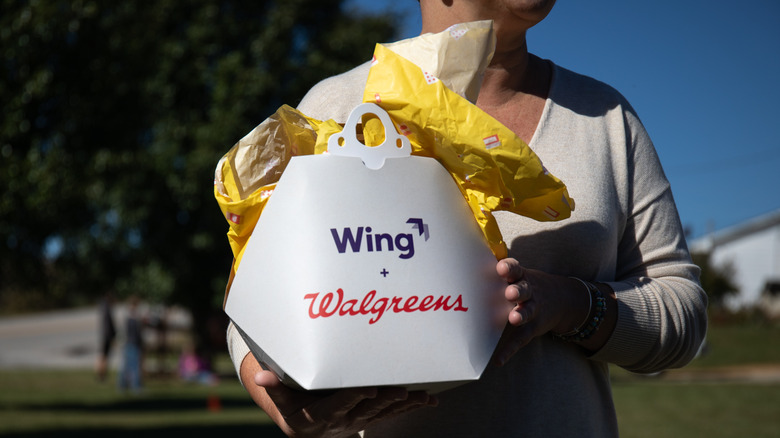 Wing's cardboard box that attaches to its drones