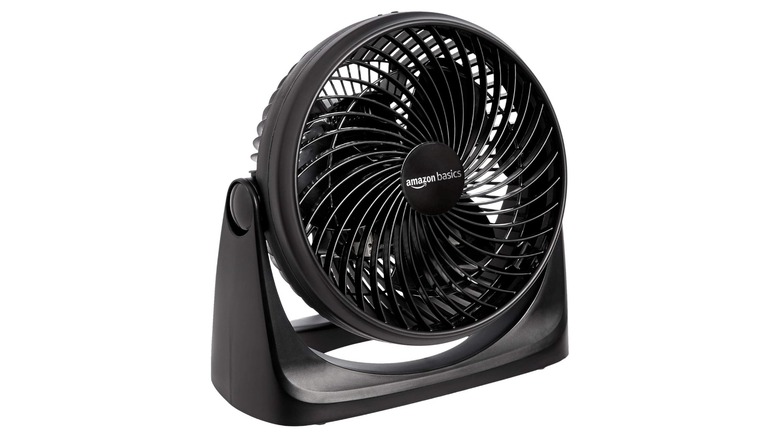 Round black fan on a swivel base