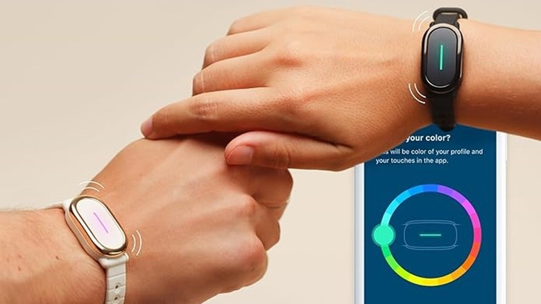 bond touch bracelet next to app