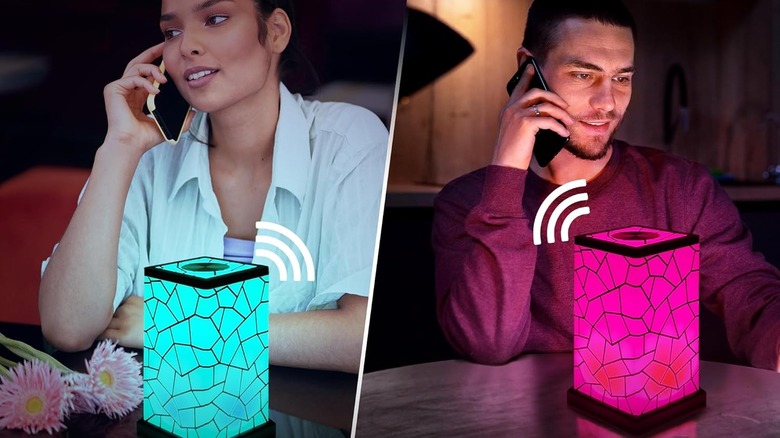 woman and man in front of lamp