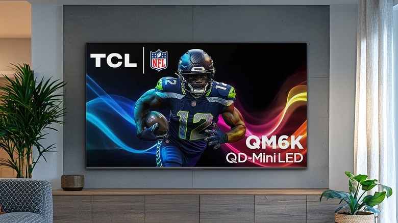 A TCL QM64L Mini LED TV in a living room