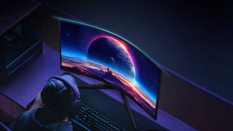 Gamer playing on the Samsung Odyssey G55C Gaming Monitor