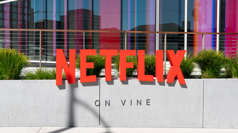 Netflix sign above sidewalk