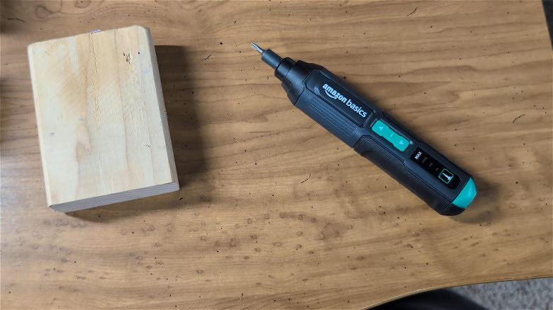 The Amazon Basics by Skil 4V Cordless Stick Screwdriver on a table.