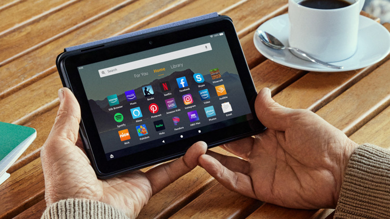 Hands holding Kindle Fire 7