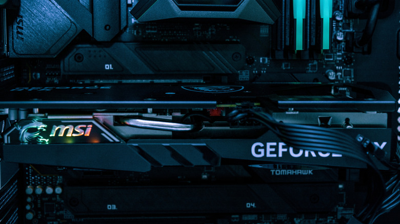An Nvidia graphics card slotted into a motherboard.