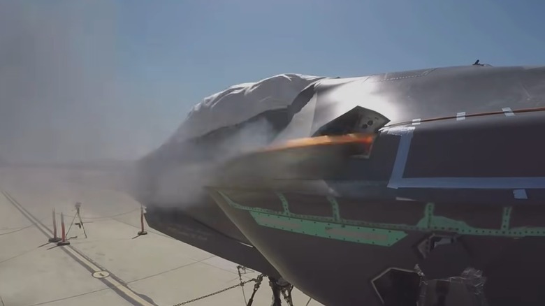 Early prototype of the F-35 test firing its gun on the ground.
