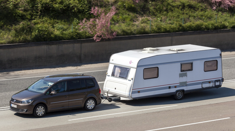 Volkswagen Touran towing a travel trailer in Europe