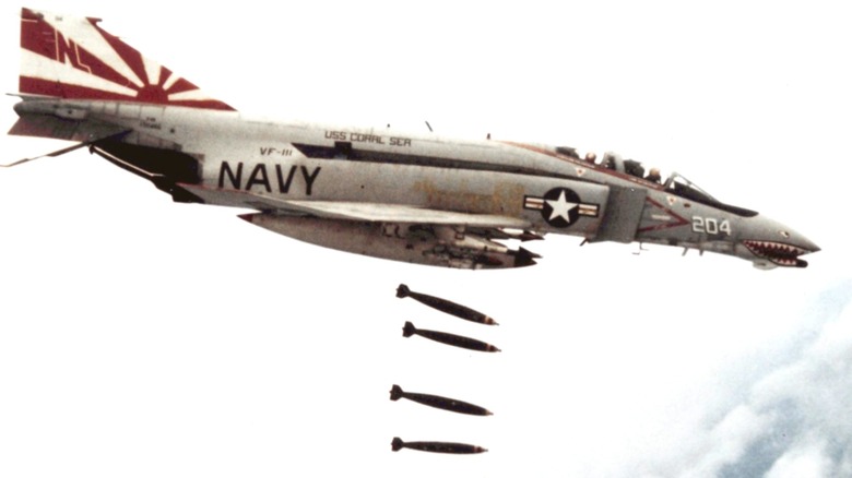 A U.S. Navy F-4B from VF-111 dropping bombs over Vietnam