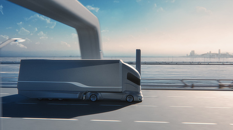 A rendering of a self-driving truck crossing a bridge.