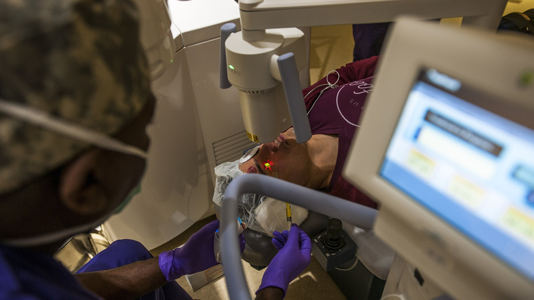 Doctor performing eye surgery