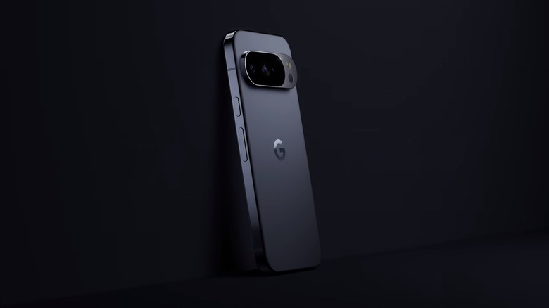 A black/gray Google Pixel 10 Pro leaning on a black background