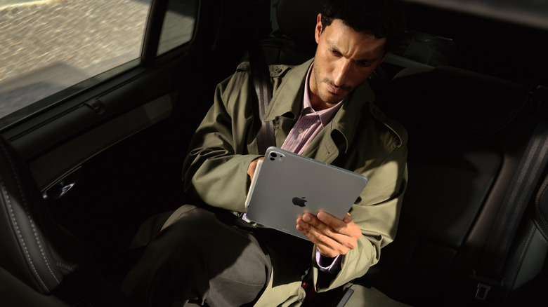 Person using an M5 Apple iPad Pro