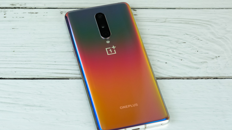 A OnePlus 8 showing its colorful back