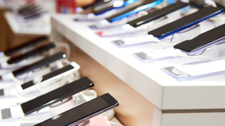 Several phones arranged in a store