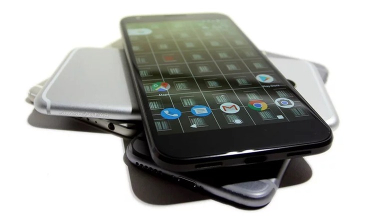 a stack of Android smartphones