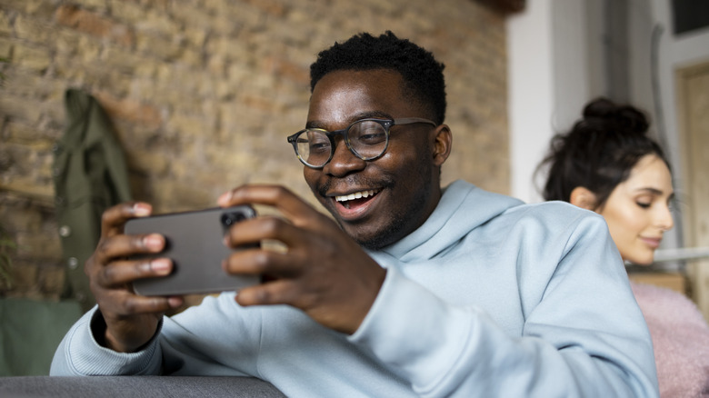 Man using iPhone