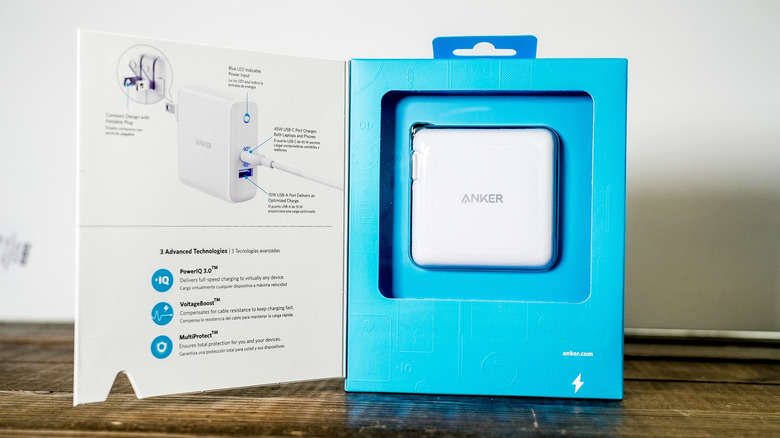 An Anker wall charger in retail packaging