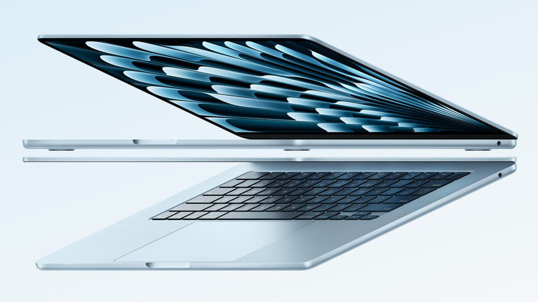 M4 MacBook Air laptops floating in air with lids open
