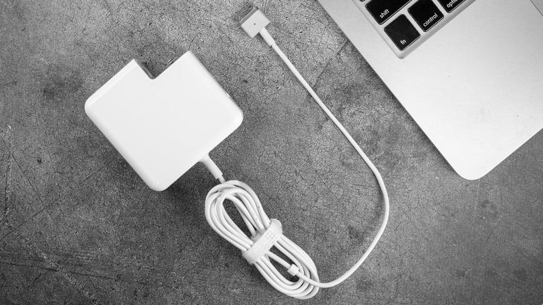 A MagSafe 2 connector and power adapter. This version of MagSafe had the cable integrated into the wall adapter.