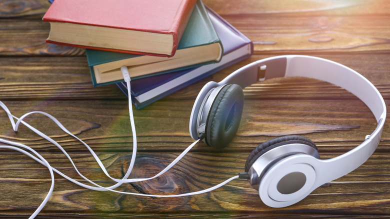 headphones near books