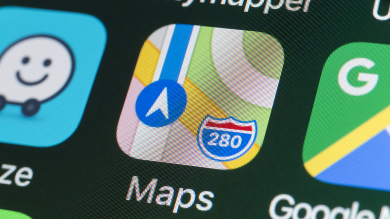 Different navigation apps, including Apple Maps, on a screen.