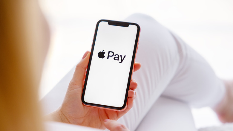 Woman using Apple Pay