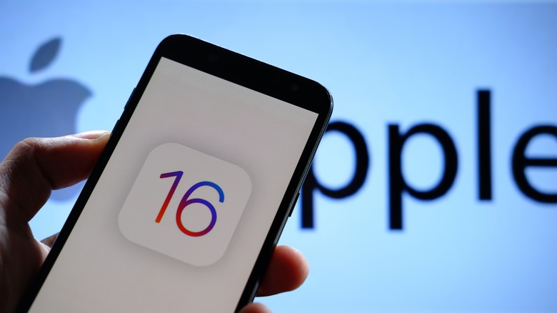 iOS 16 logo on iPhone screen