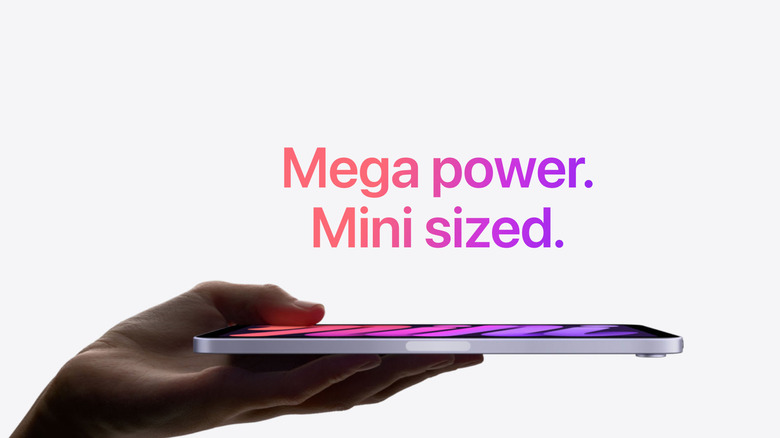hand holding an iPad Mini 