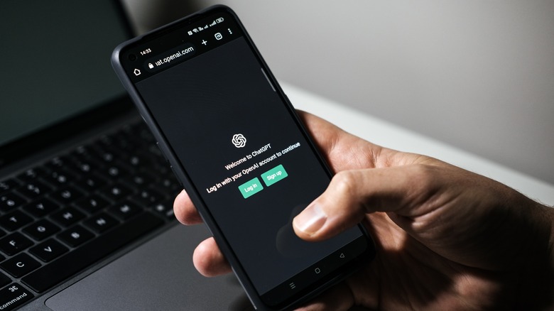 Person using ChatGPT on smartphone