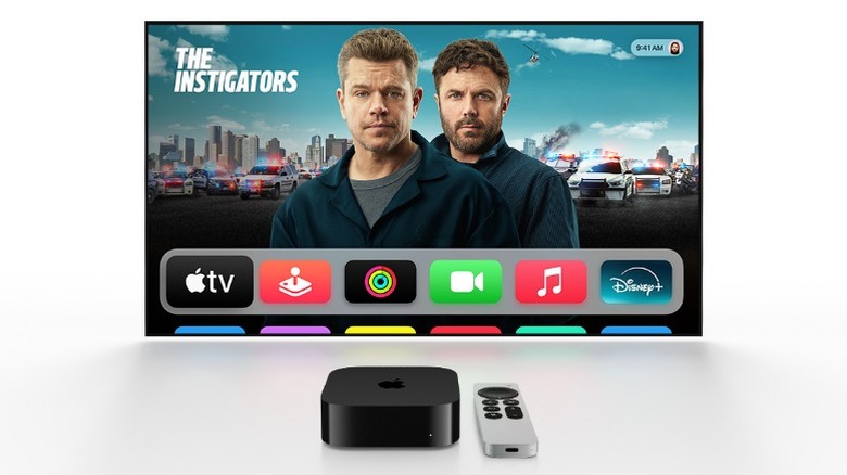 TV and Apple TV 4K box with remote on white background