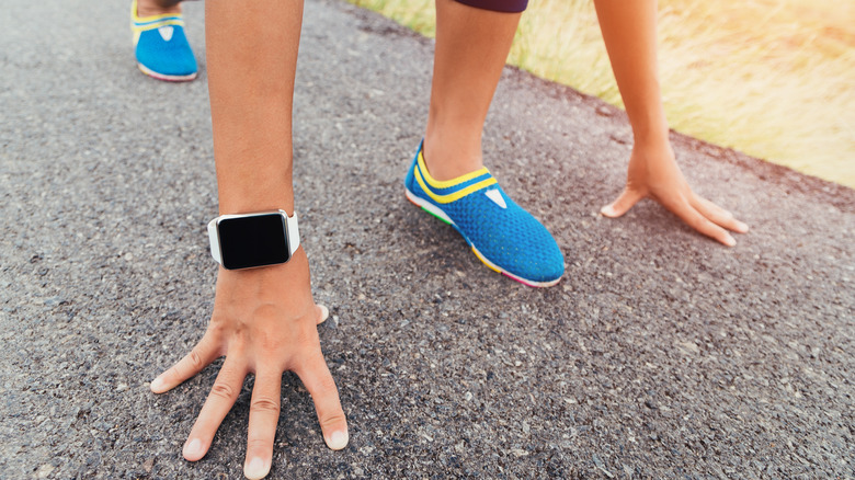 runner wearing smartwatch