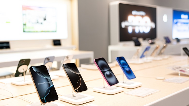 iPhone 16 devices on display at Apple Store