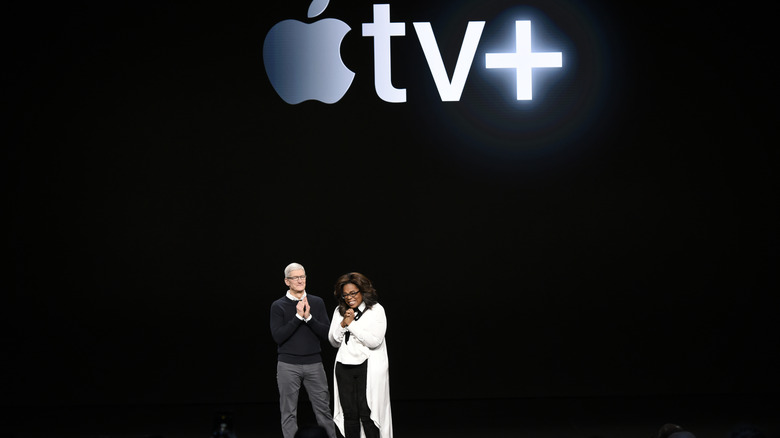 Tim Cook and Oprah Winfrey