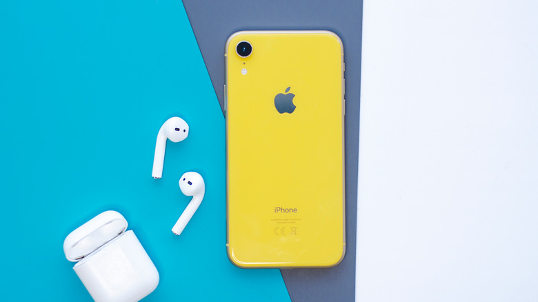 iPhone yellow with airpods