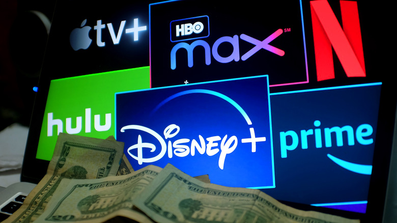 Pile of money in front of streaming service logos