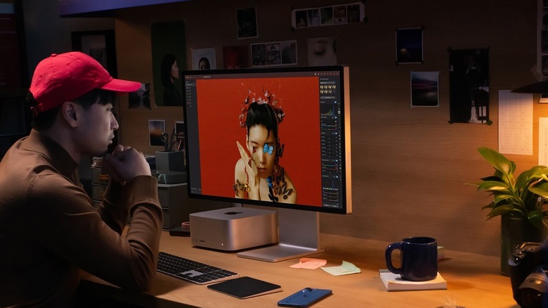 Man using Apple Studio Display