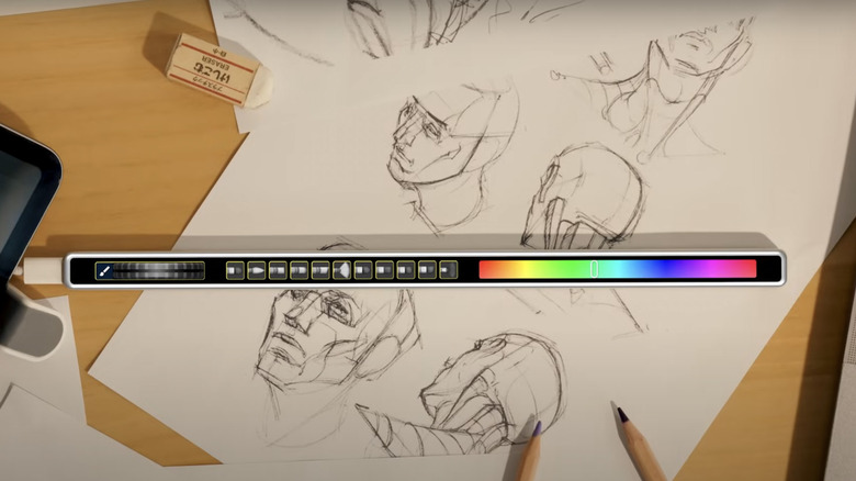The ENIAC Flexbar customizable touch-bar being used for design with sketches behind it.