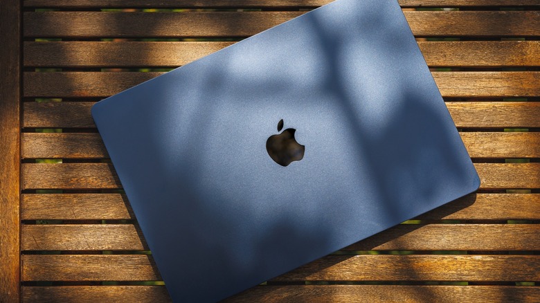 Midnight Blue MacBook on a wooden surface
