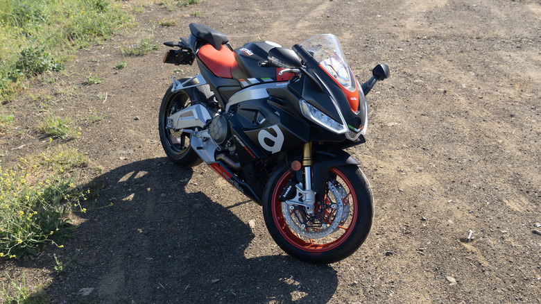 Aprilia RS660 front three quarters dramatic lighting