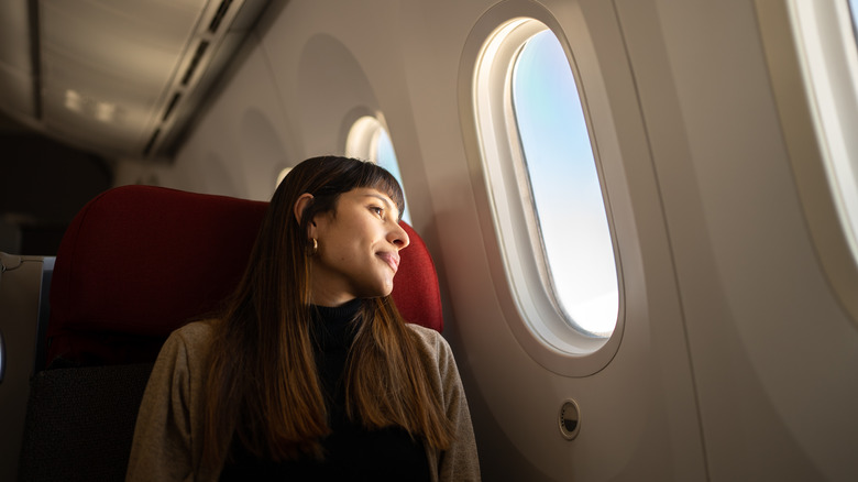 woman riding airplane