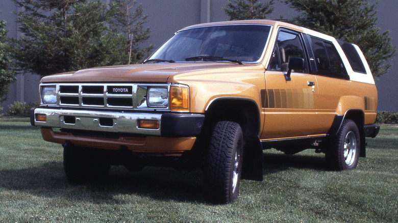 Gold 1985 Toyota 4Runner parked on grass