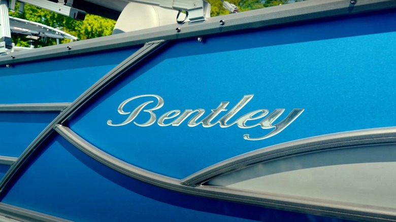 Close-up view of the logo on a Bentley Pontoons boat.