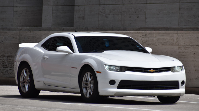 Chevrolet Camaro parked against gray background, front-right view