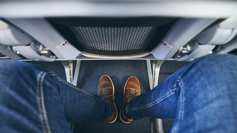 Cramped legs in airplane seat