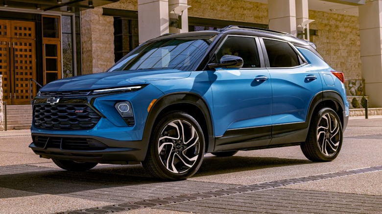 2025 Chevrolet Trailblazer parked on a paved surface in front of a building